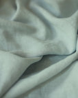 The Handwoven Linen Bedspread, a soft and airy layer that brings effortless elegance to the bedroom. Crafted from handwoven linen, its texture adds warmth and character, blending seamlessly with a relaxed, modern aesthetic.