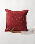 Cushion Cover – A charming cotton cushion cover in a deep red hue, delicately block-printed with floral motifs. The soft, breathable cotton fabric and traditional hand-block printing technique bring warmth and character, making it a perfect accent piece for cozy, timeless interiors