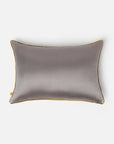 Mehira Silk Cushion Cover – A striking silk cushion cover woven with intricate geometric patterns in deep blue, gold, and maroon hues. The shimmering silk fabric catches the light, revealing a rich interplay of textures and tones. Expertly handcrafted, this cushion cover embodies the finesse of traditional weaving, adding an elegant and sophisticated touch to any space.