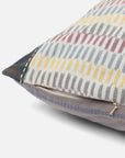 Sofia Cushion Cover – A beautifully handwoven cotton cushion cover featuring a subtle ikat-inspired pattern in warm, earthy tones of yellow, grey, and burgundy. Finished with delicate hand-stitched detailing and a contrasting dark-hued border, this piece embodies craftsmanship and understated elegance. Perfect for adding texture and character to any living space.