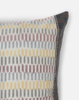 Sofia Cushion Cover – A beautifully handwoven cotton cushion cover featuring a subtle ikat-inspired pattern in warm, earthy tones of yellow, grey, and burgundy. Finished with delicate hand-stitched detailing and a contrasting dark-hued border, this piece embodies craftsmanship and understated elegance. Perfect for adding texture and character to any living space.