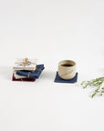Handcrafted Cotton Coasters – A set of handwoven cotton coasters, featuring hand block-printed floral and abstract designs. Each piece is carefully crafted, bringing a refined yet natural touch to your table setting. Perfect for adding warmth and artistry to your daily moments.