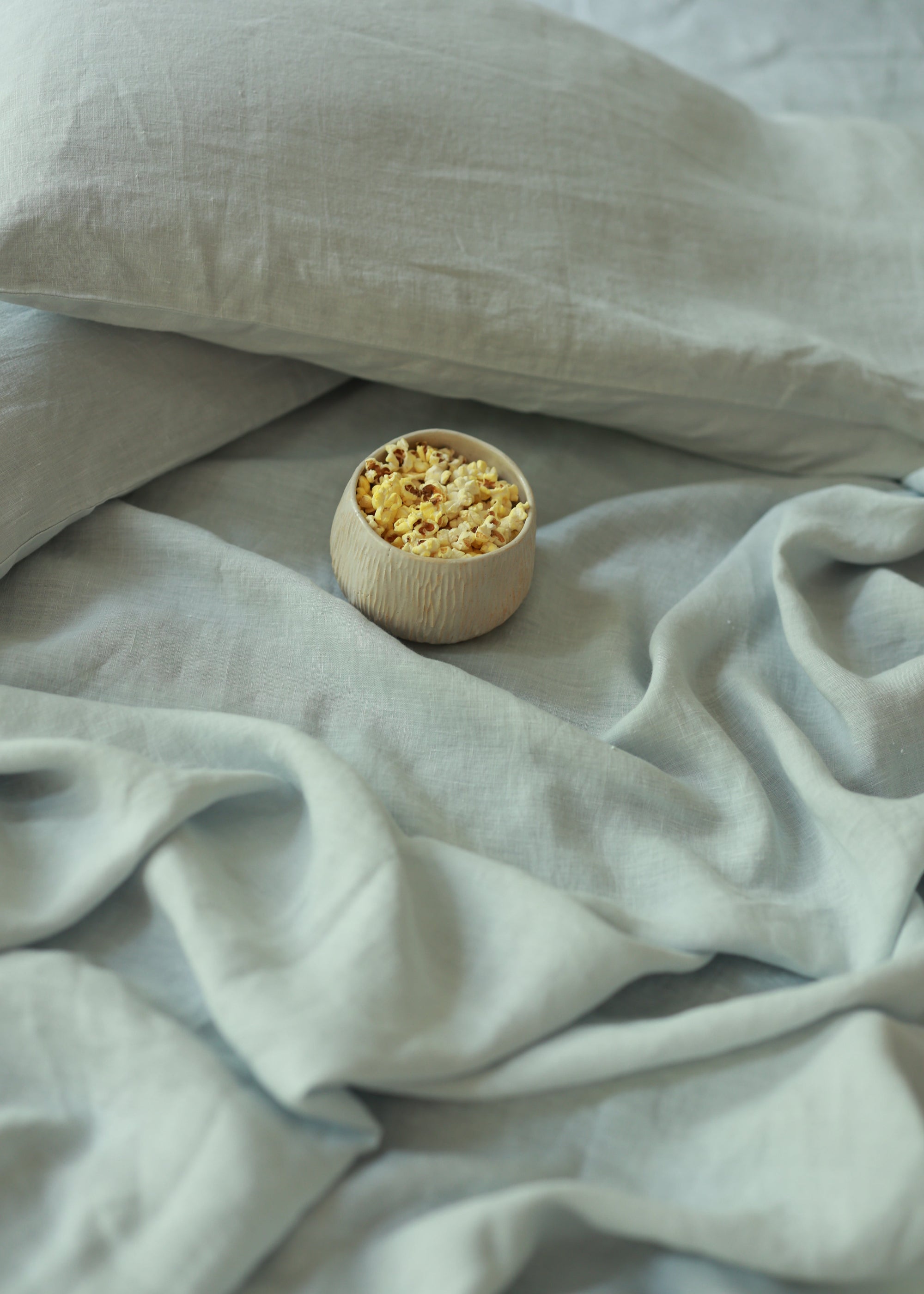 The Handwoven Linen Bedspread, a soft and airy layer that brings effortless elegance to the bedroom. Crafted from handwoven linen, its texture adds warmth and character, blending seamlessly with a relaxed, modern aesthetic.