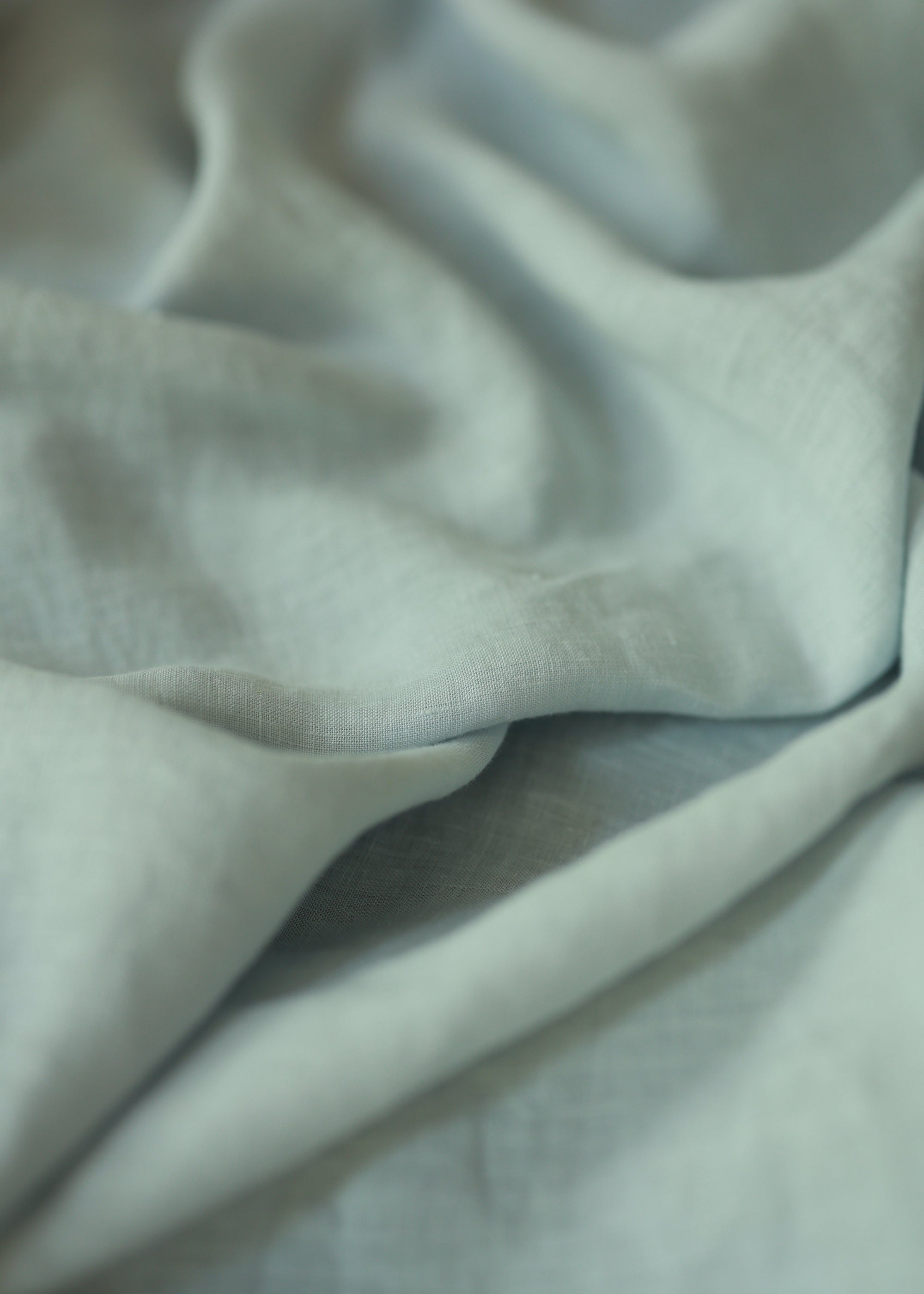 The Handwoven Linen Bedspread, a soft and airy layer that brings effortless elegance to the bedroom. Crafted from handwoven linen, its texture adds warmth and character, blending seamlessly with a relaxed, modern aesthetic.