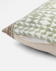Vivia Cushion Cover – A refined blend of silk and cotton, this cushion cover showcases an intricate ikat-inspired pattern in soft sage green and ivory. Handwoven with exceptional craftsmanship, its delicate striped borders add a touch of elegance. A versatile piece that enhances both contemporary and traditional spaces.